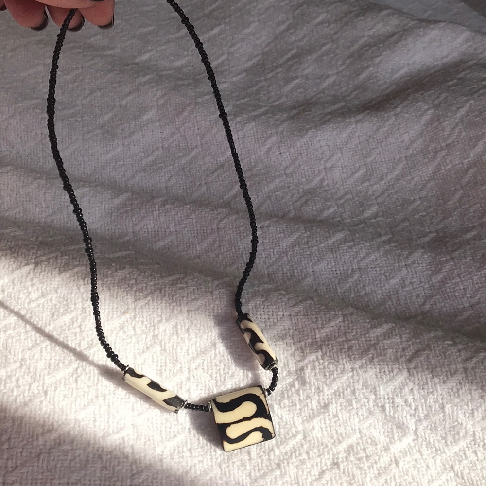 BoHo Handmade onyx bead and unknown stone.